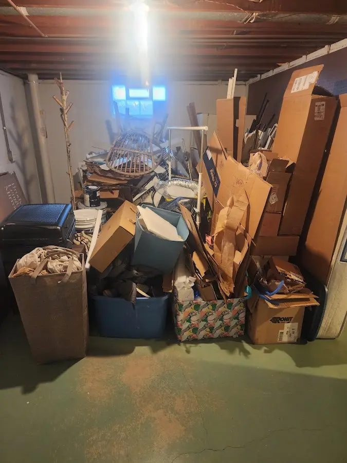 Roll-off dumpster container at job site for 8 Yard Dumpster Rental in Essex